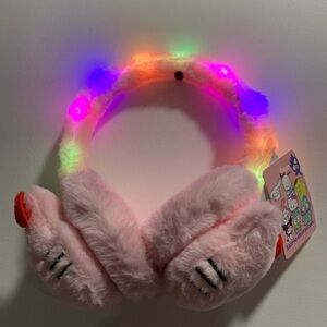 Hello Kitty Light up ear muffs. Super soft! Hello Kitty ear warmers